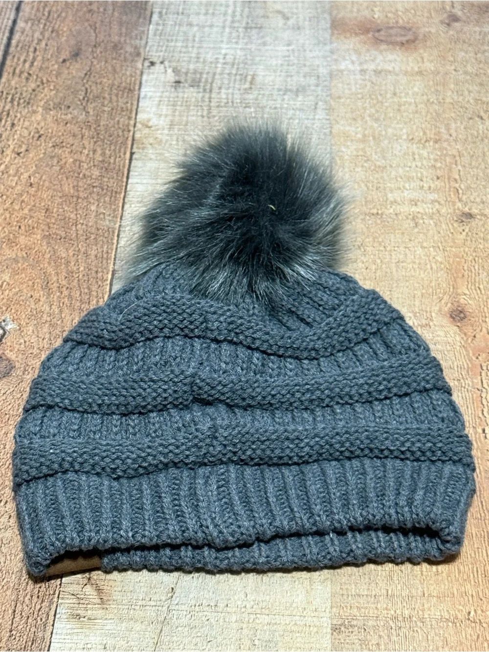Upcycled luxury CC Pom Pom gray beanie hat
One size
Good pre owned condition